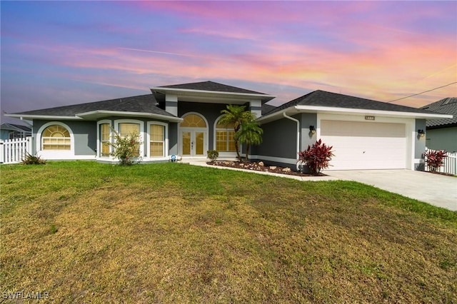 3113 SW 22nd Pl, Cape Coral, FL 33914 - ranch-style house with french doors, stucco siding, a garage, and concrete driveway