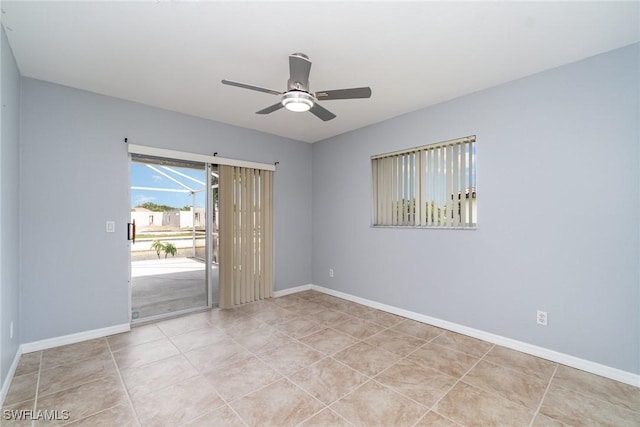 3113 SW 22nd Pl, Cape Coral, FL 33914 - spare room with ceiling fan, baseboards, and tile patterned floors