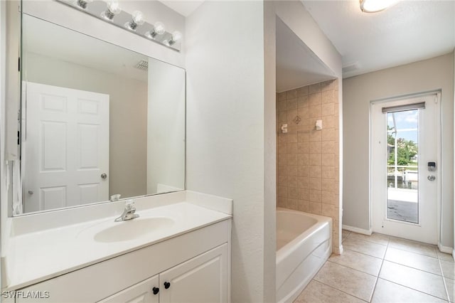 3113 SW 22nd Pl, Cape Coral, FL 33914 - bathroom with tile patterned flooring, vanity, and baseboards