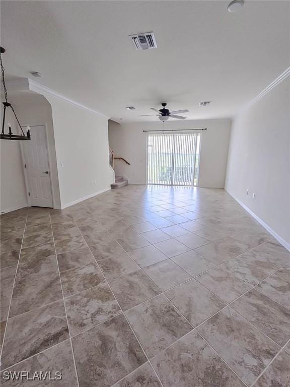 2685 Citrus St, Naples, FL 34120 - unfurnished living room featuring visible vents, tile patterned floors, stairway, crown molding, and ceiling fan