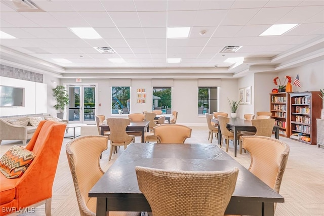 2685 Citrus St, Naples, FL 34120 - dining space featuring a paneled ceiling, light carpet, a tray ceiling, and visible vents