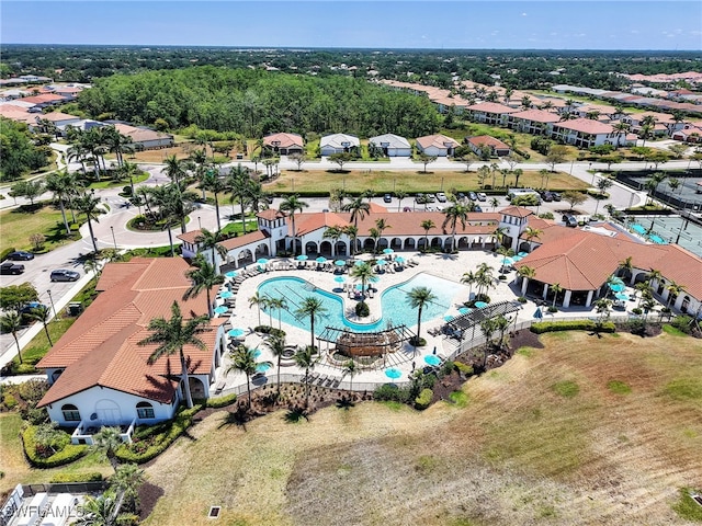 aerial view of residential area featuring a pool area