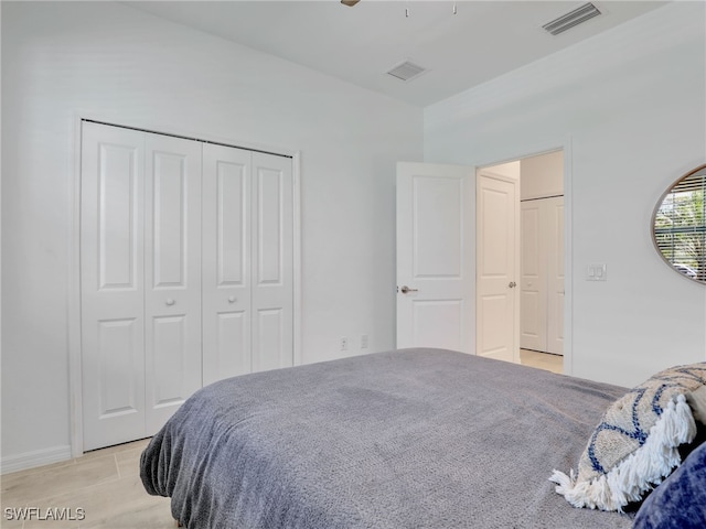 bedroom featuring a closet and ceiling fan