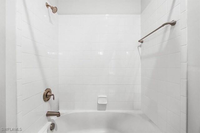 full bath featuring washtub / shower combination