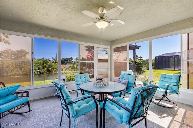 614 SW 31st Ter, Cape Coral, FL 33914 - sunroom featuring ceiling fan, a water view, and outdoor dining space