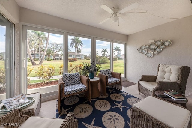 325 Charlemagne Blvd Unit A104, Naples, FL 34112 - sunroom with a ceiling fan, plenty of natural light, and outdoor lounge area