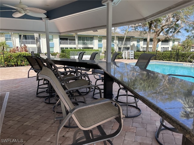 325 Charlemagne Blvd Unit A104, Naples, FL 34112 - view of patio / terrace featuring ceiling fan