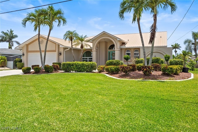1222 SW 54th St, Cape Coral, FL 33914 - view of front of house with stucco siding, driveway, and a garage