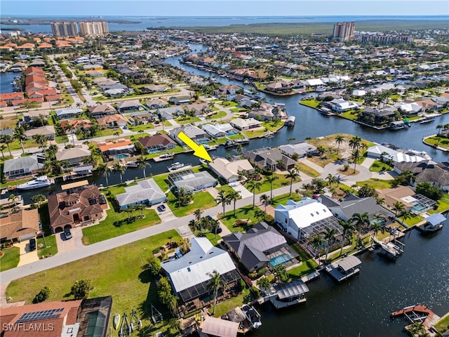 1222 SW 54th St, Cape Coral, FL 33914 - aerial view of property's location with a large body of water and nearby suburban area