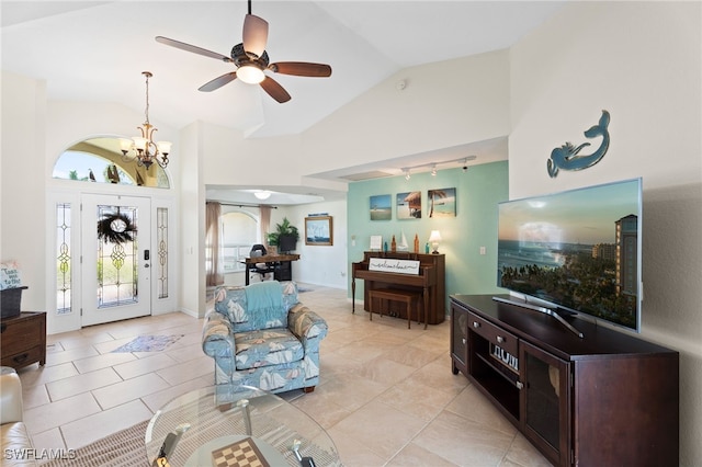 1222 SW 54th St, Cape Coral, FL 33914 - living room featuring vaulted ceiling, a ceiling fan, a chandelier, light tile patterned flooring, and rail lighting