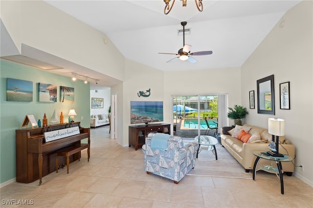 1222 SW 54th St, Cape Coral, FL 33914 - living room with ceiling fan, baseboards, track lighting, and high vaulted ceiling
