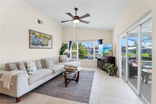 1222 SW 54th St, Cape Coral, FL 33914 - living room with vaulted ceiling, a ceiling fan, and light tile patterned floors