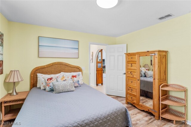 1222 SW 54th St, Cape Coral, FL 33914 - bedroom with light wood-style flooring and baseboards