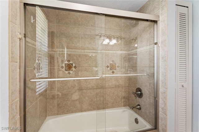 1222 SW 54th St, Cape Coral, FL 33914 - bathroom featuring a closet and shower / bath combination with glass door