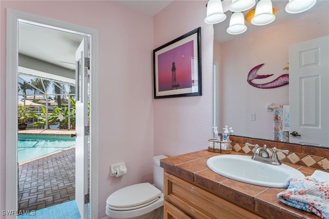1222 SW 54th St, Cape Coral, FL 33914 - bathroom with toilet and vanity