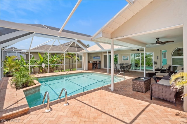 1222 SW 54th St, Cape Coral, FL 33914 - swimming pool featuring a ceiling fan, a patio area, outdoor dining space, and glass enclosure