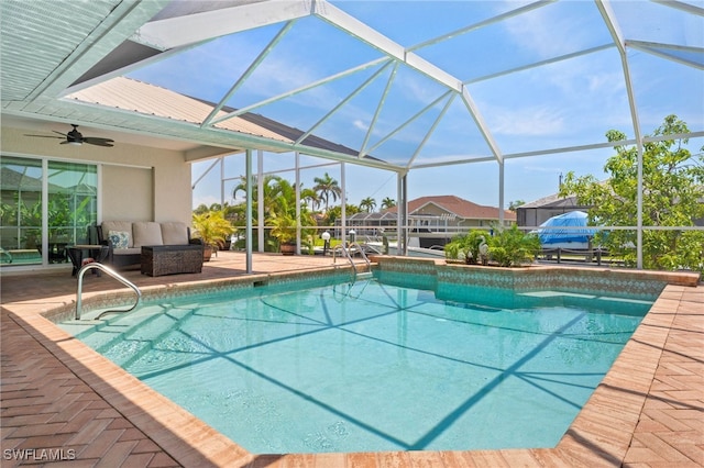 1222 SW 54th St, Cape Coral, FL 33914 - outdoor pool with a patio, an outdoor living space, and glass enclosure