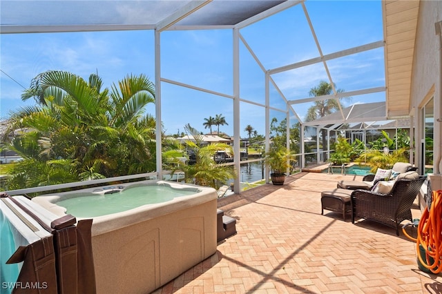1222 SW 54th St, Cape Coral, FL 33914 - view of patio / terrace with a hot tub, a water view, and glass enclosure