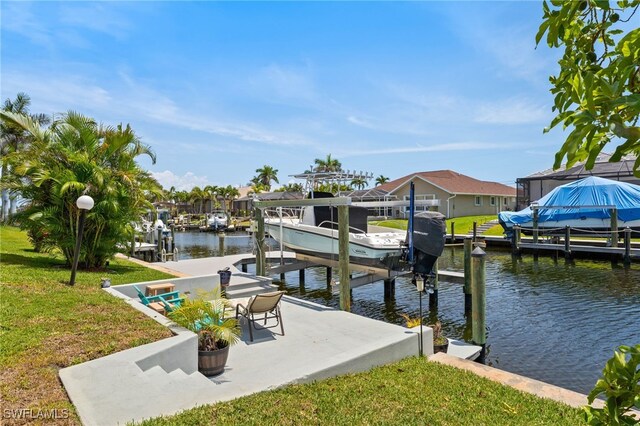 1222 SW 54th St, Cape Coral, FL 33914 - dock area with boat lift, a water view, and a yard
