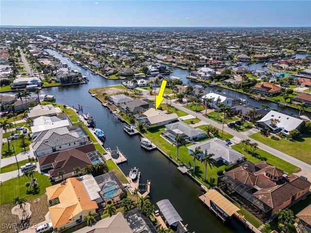 1222 SW 54th St, Cape Coral, FL 33914 - aerial view of residential area featuring a nearby body of water