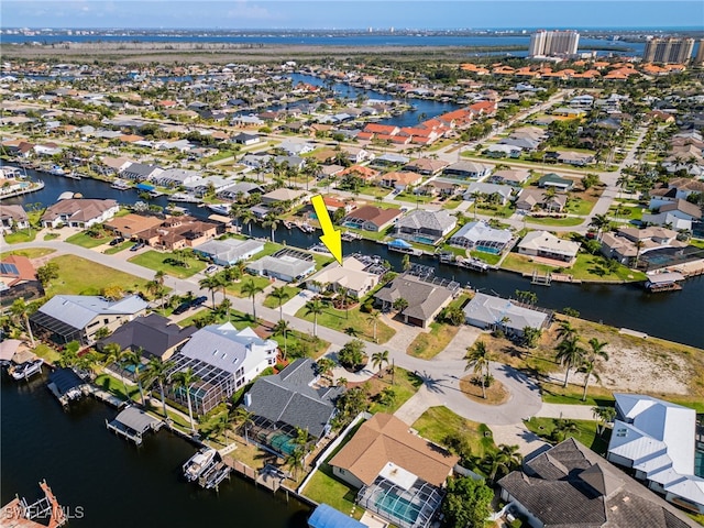 1222 SW 54th St, Cape Coral, FL 33914 - aerial view of property's location with a large body of water and nearby suburban area