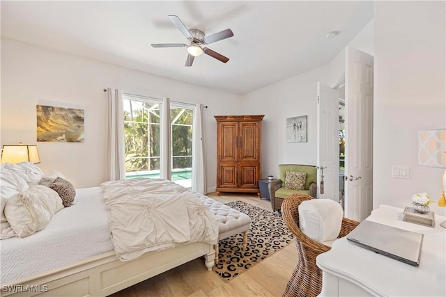 3803 Valentia Way, Naples, FL 34119 - bedroom featuring access to exterior, light wood finished floors, and ceiling fan