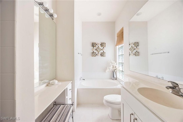 3803 Valentia Way, Naples, FL 34119 - full bathroom with vanity, toilet, a garden tub, and tile patterned floors