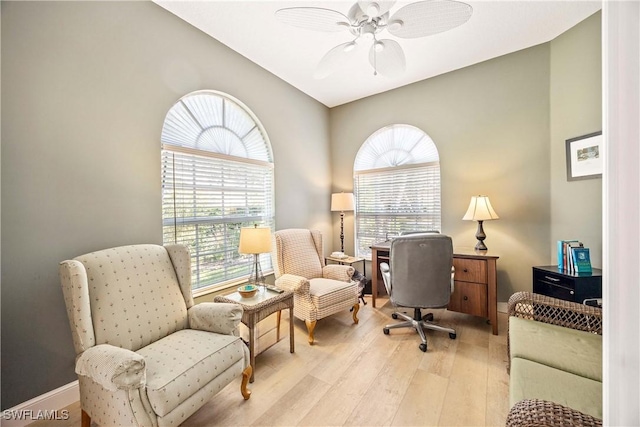 3803 Valentia Way, Naples, FL 34119 - home office with light wood-style flooring, healthy amount of natural light, a ceiling fan, baseboards, and vaulted ceiling