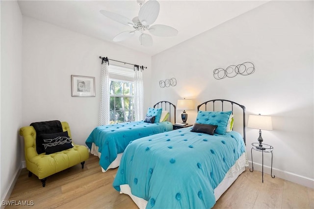 3803 Valentia Way, Naples, FL 34119 - bedroom with wood finished floors, baseboards, and ceiling fan