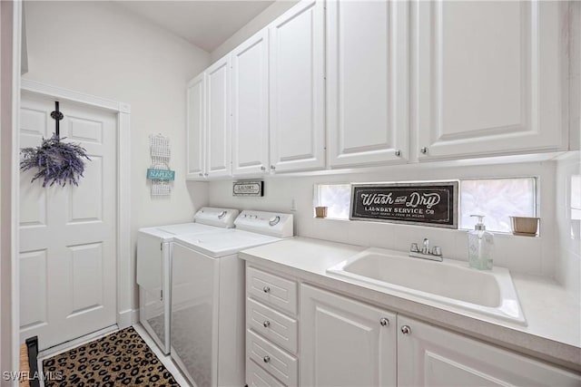 3803 Valentia Way, Naples, FL 34119 - laundry room featuring cabinet space and independent washer and dryer