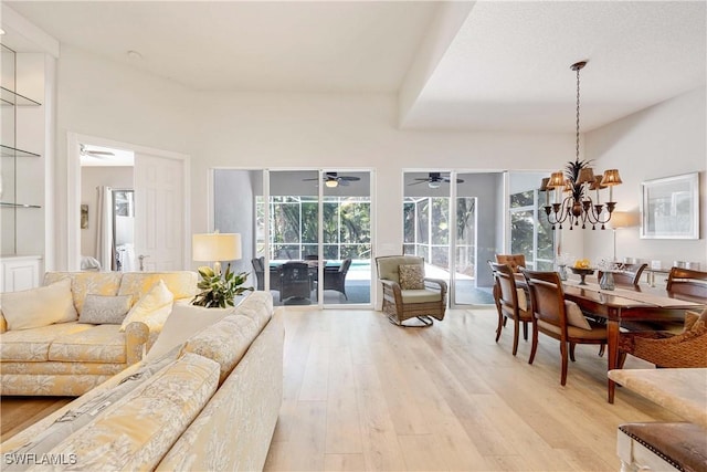 3803 Valentia Way, Naples, FL 34119 - living area featuring light wood-style floors, ceiling fan, and a sunroom