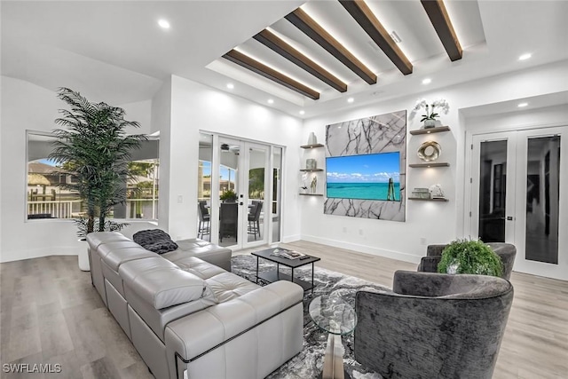 living area with french doors, recessed lighting, wood finished floors, baseboards, and beam ceiling