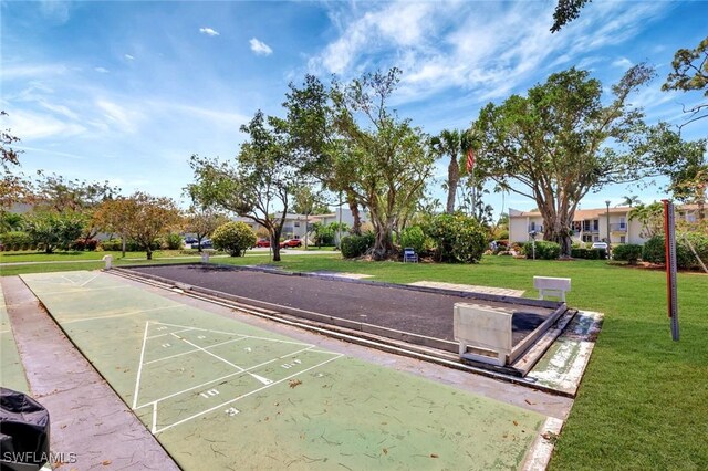 7400 College Pkwy Unit 5A, Fort Myers, FL 33907 - surrounding community featuring shuffleboard and a yard
