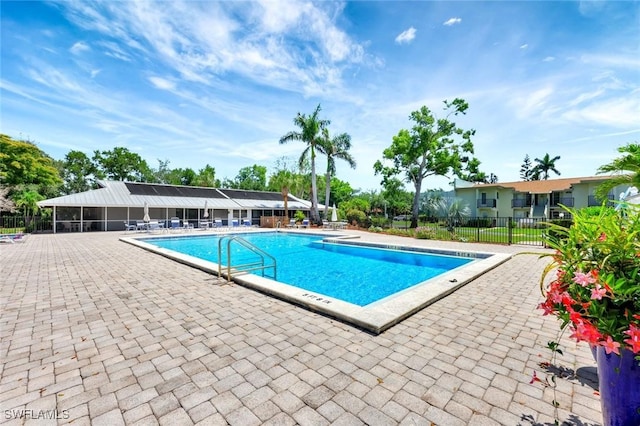 7400 College Pkwy Unit 5A, Fort Myers, FL 33907 - community pool with fence and a patio