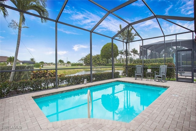 1421 Lucena Ln S, Naples, FL 34113 - swimming pool with a patio, a water view, and glass enclosure
