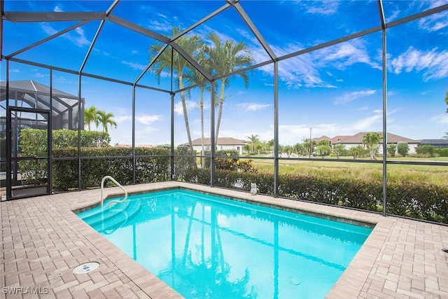 1421 Lucena Ln S, Naples, FL 34113 - swimming pool with a lanai and a patio