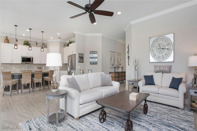 1421 Lucena Ln S, Naples, FL 34113 - living area with ceiling fan, recessed lighting, and ornamental molding