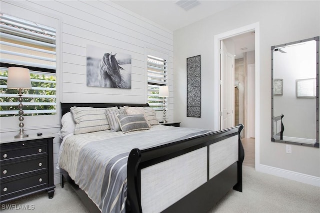 1421 Lucena Ln S, Naples, FL 34113 - bedroom featuring light carpet and baseboards