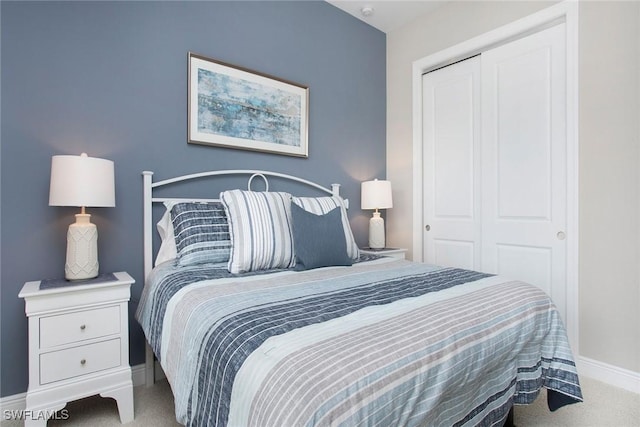 1421 Lucena Ln S, Naples, FL 34113 - bedroom featuring carpet, a closet, and baseboards