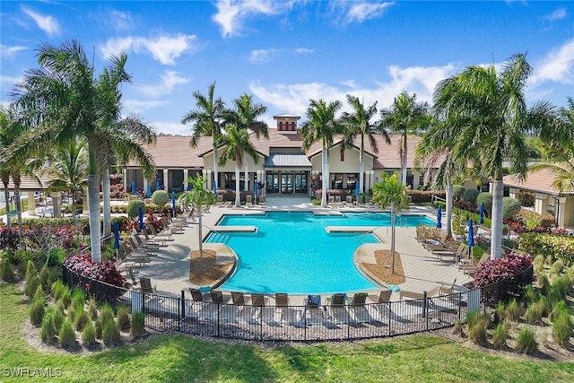 1421 Lucena Ln S, Naples, FL 34113 - community pool with fence and a patio