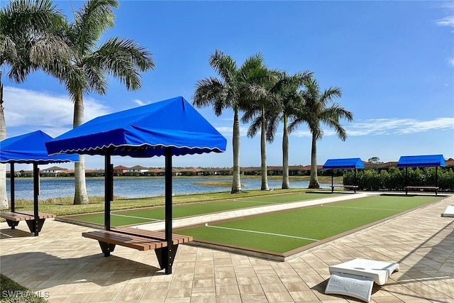 1421 Lucena Ln S, Naples, FL 34113 - surrounding community with a bocce ball area and a water view
