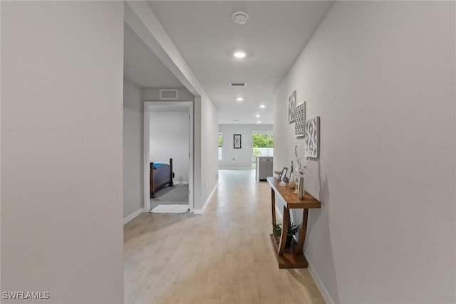 3021 June Cir, Labelle, FL 33935 - hall with light wood-type flooring, recessed lighting, and baseboards
