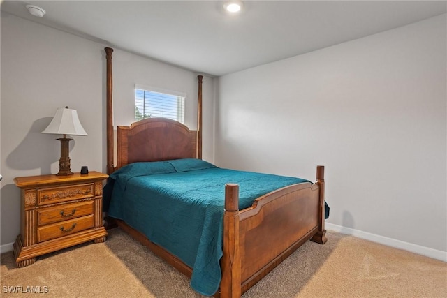 3021 June Cir, Labelle, FL 33935 - bedroom featuring light colored carpet and baseboards