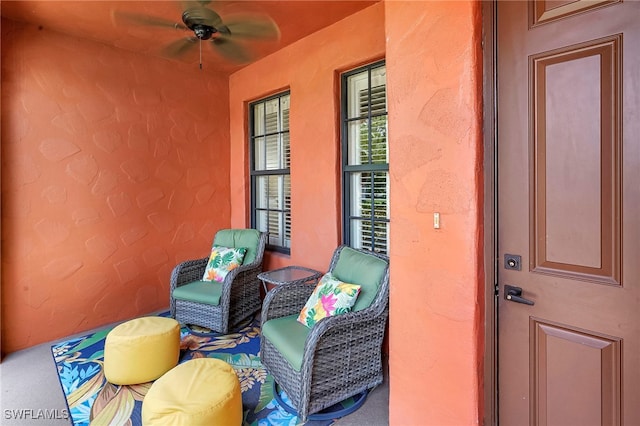 view of patio featuring a ceiling fan