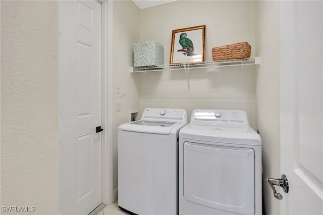 washroom featuring separate washer and dryer