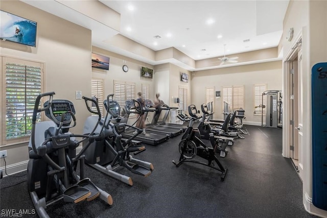 exercise room featuring a ceiling fan, baseboards, and recessed lighting