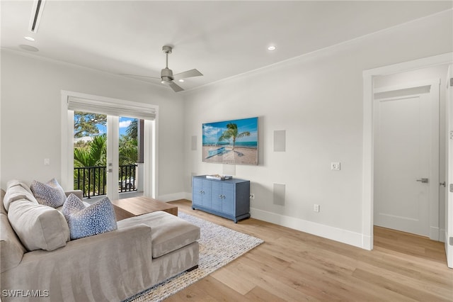 living room featuring baseboards, light wood finished floors, french doors, a ceiling fan, and recessed lighting
