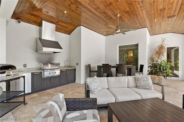 view of patio with area for grilling, an outdoor hangout area, ceiling fan, and a sink