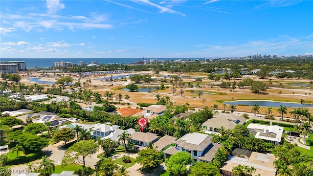view of urban area featuring a large body of water