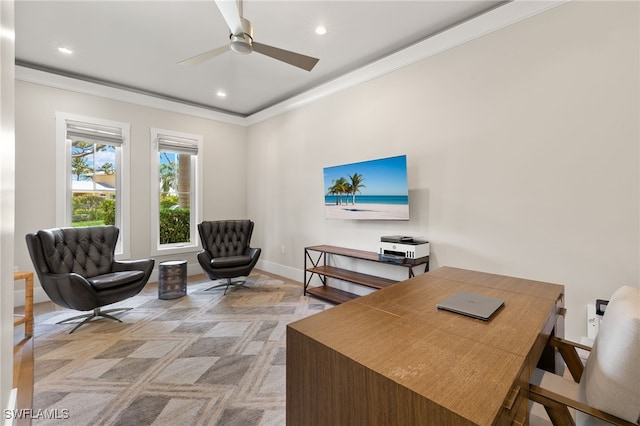 office area with ornamental molding, recessed lighting, a ceiling fan, baseboards, and light colored carpet